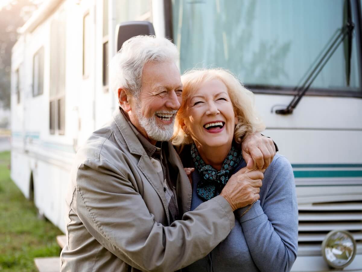 Happy Smiling Old Couple outside RV